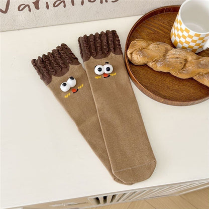 Whimsical Duo's Delightful Tube Socks with Gigantic Giggle Eyes