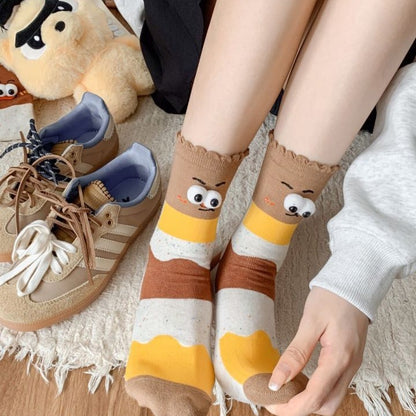 Whimsical Duo's Delightful Tube Socks with Gigantic Giggle Eyes