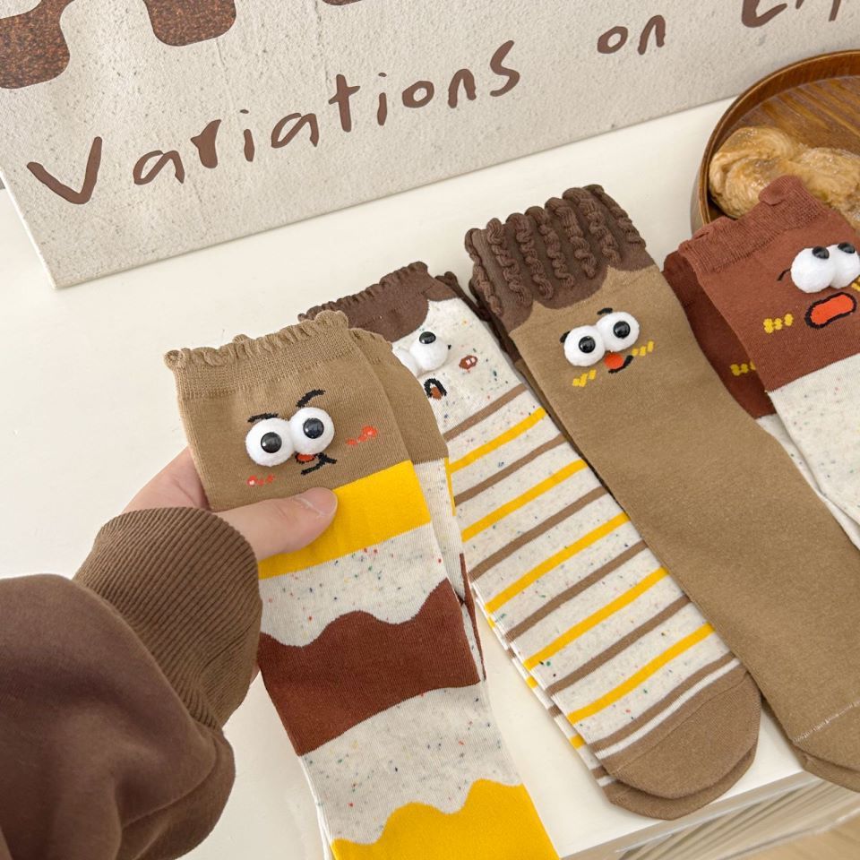 Whimsical Duo's Delightful Tube Socks with Gigantic Giggle Eyes